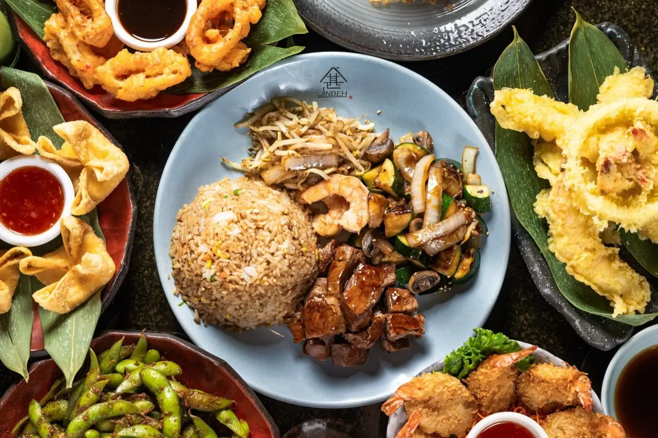 Fresh Japanese takeout from Jinbeh including sushi rolls and appetizers