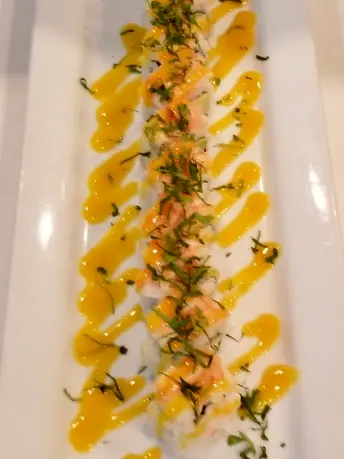 Tiger Roll, shrimp tempura with spicy tuna and jalapeño