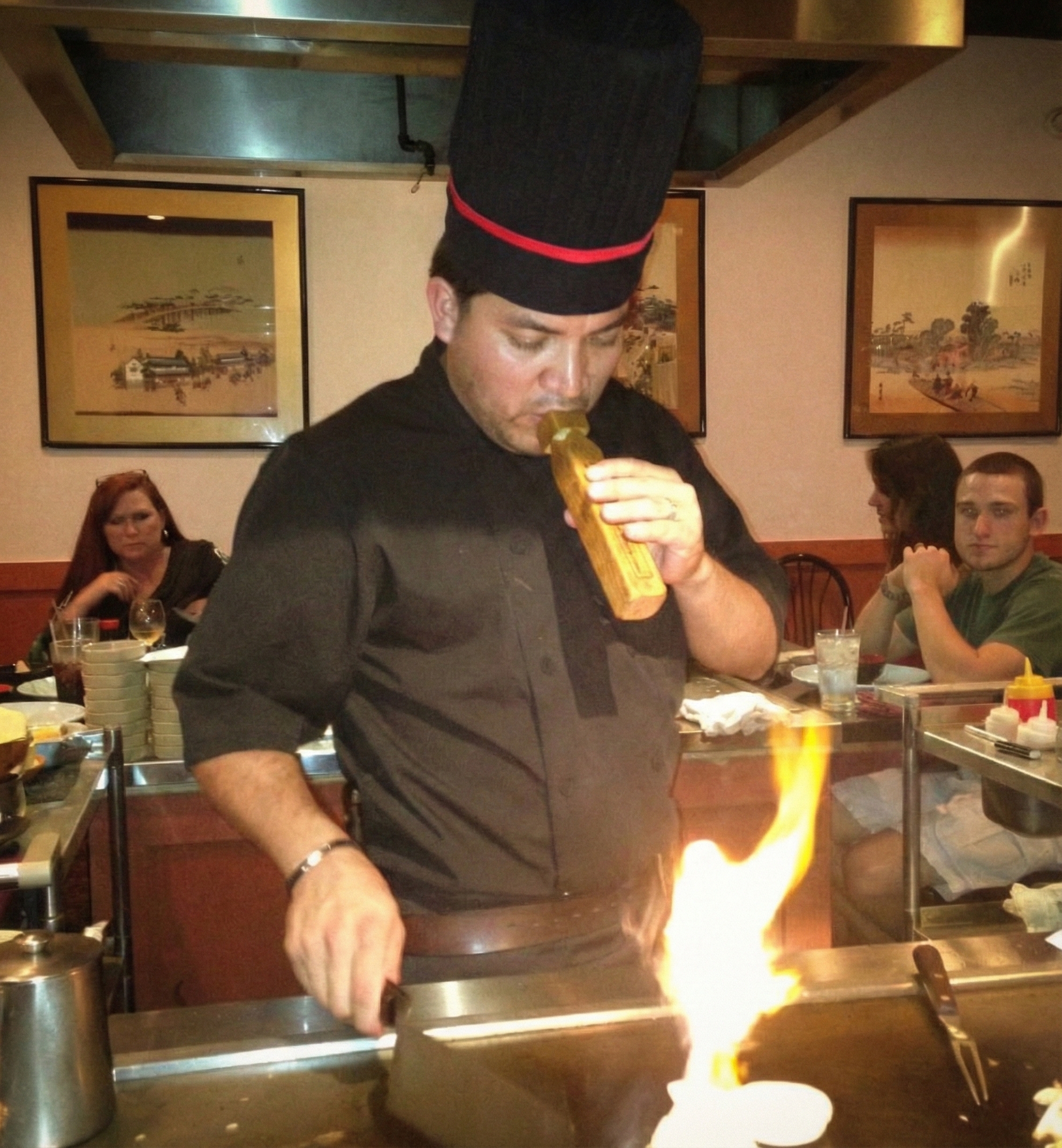 Hibachi chef cooking at Jinbeh Lewisville near Castle Hills